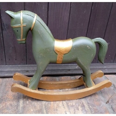 Koń na biegunach drewniany