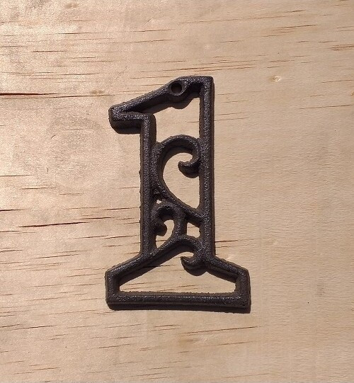 Cyfra 1 ozdoba ścienna żeliwna