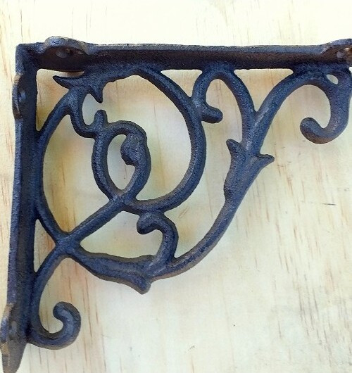 Żeliwny wspornik z hakiem brąz