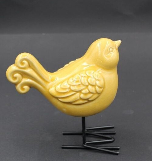 Ptaszek ceramiczny na nóżkach żółty