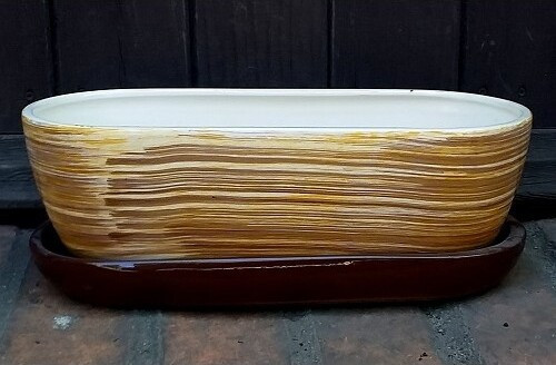 Doniczka kaktusiarka owalna żółto-brązowe paski