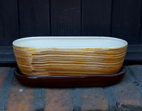 Doniczka kaktusiarka owalna żółto-brązowe paski